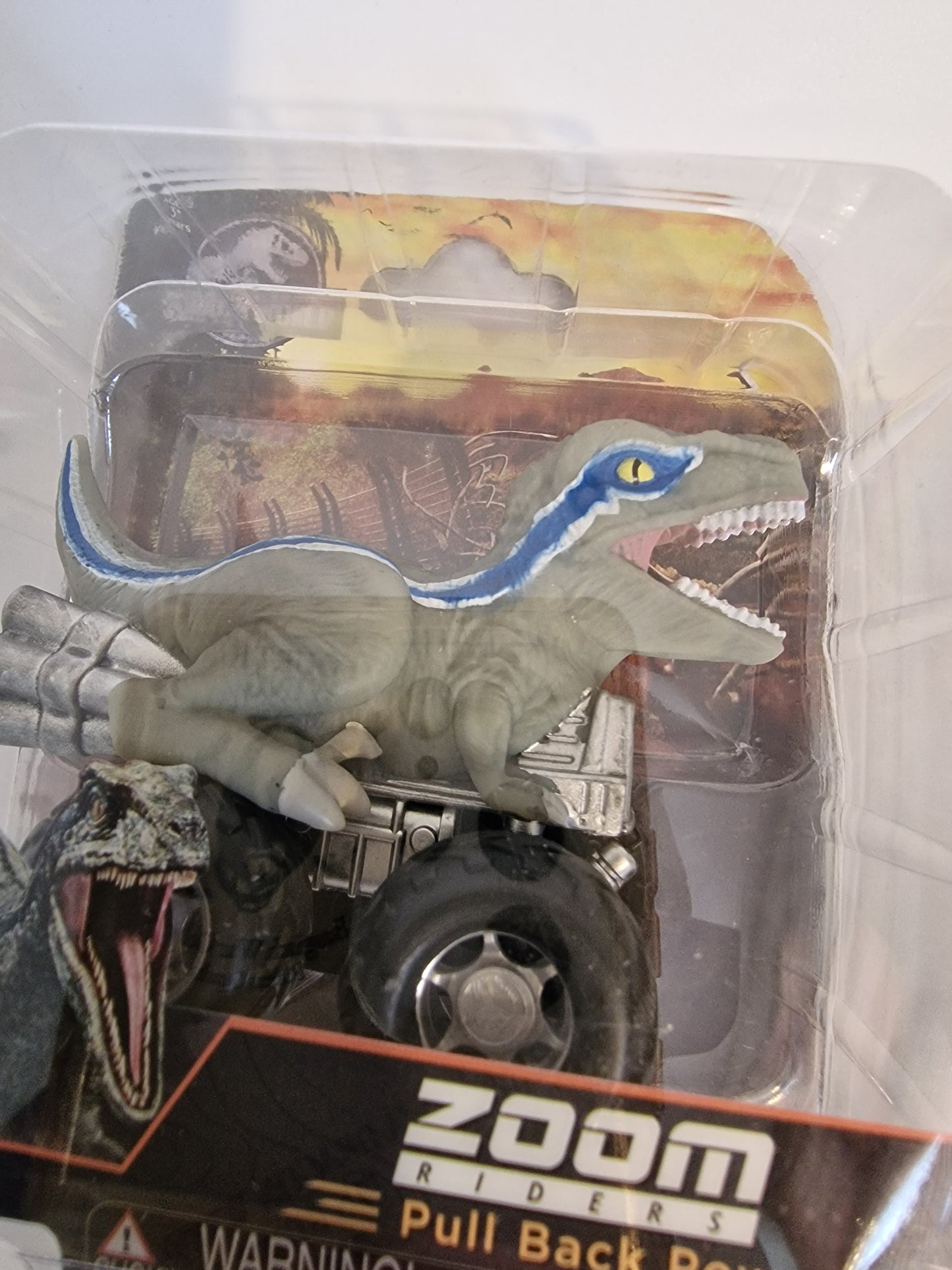 Jurassic World Blue Velociraptor Zoom Riders Pull Back Dino Car Toy NEW