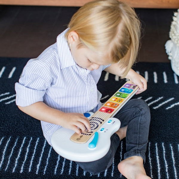 Baby Einstein's Hape Strum Along Songs Magic Touch Guitar